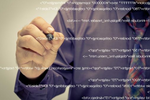 man-writing-code-ss-1920