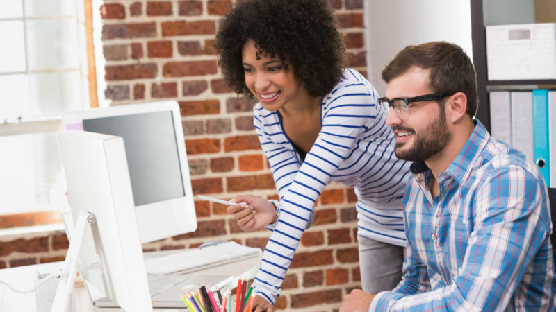 man and woman working together