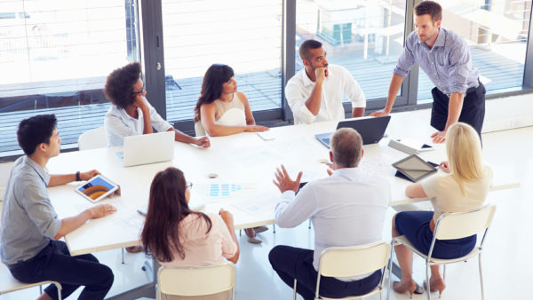 team-meeting-around-table-stock