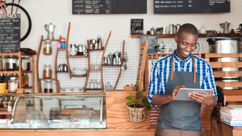 Small business owner using tablet