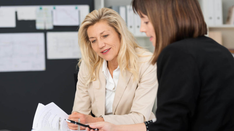 Women in c-suite meeting