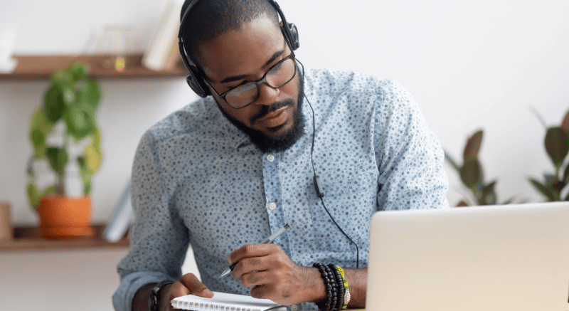 Man engaged in online learning.