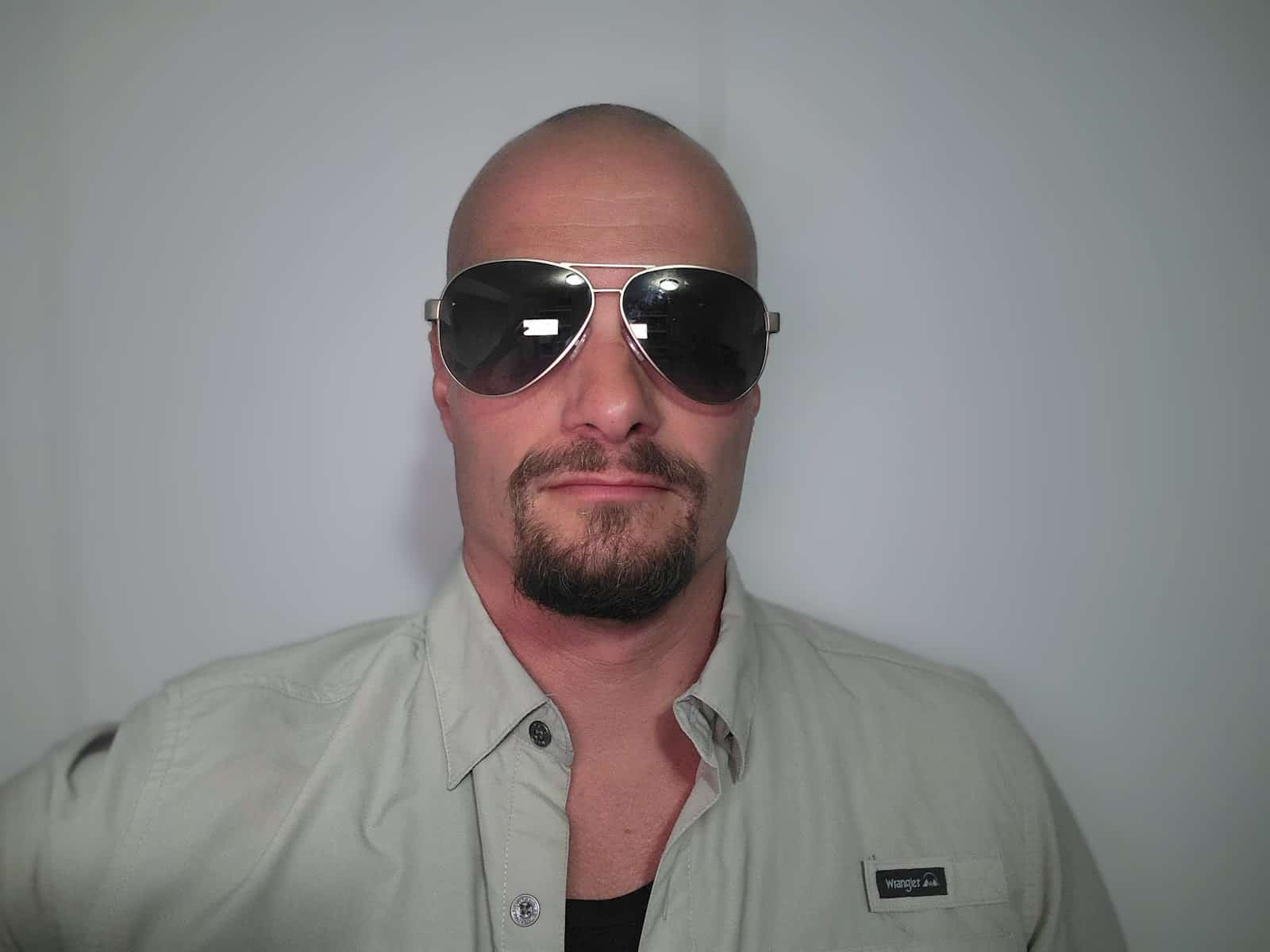 The author wearing a pair of Hugo Boss sunglasses