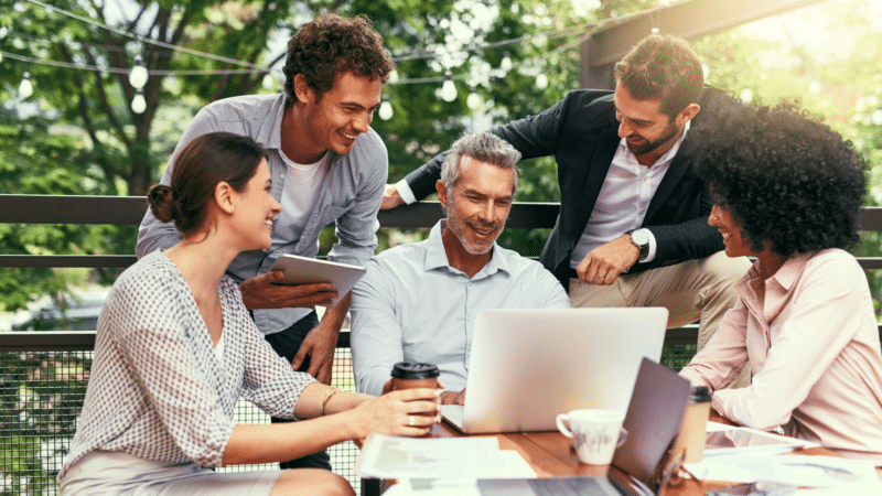 Colleagues meeting outdoors