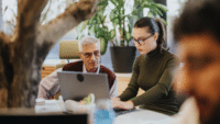 Different-aged-business-professionals-collaborating