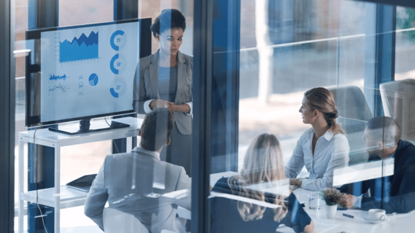 Marketer-presenting-performance-report-to-colleagues