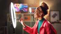 Woman-influencer-and-phone-with-ring-light-for-video-recording