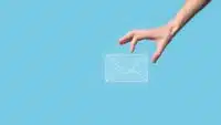 Hand holding envelope - Email marketing concept