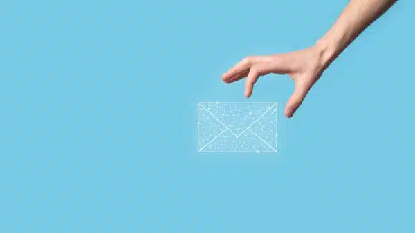 Hand-holding-envelope-Email-marketing-concept