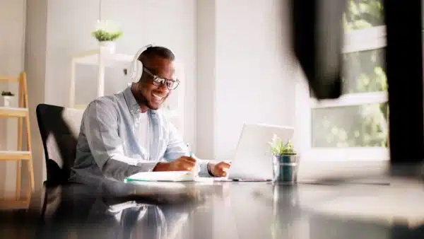 Man-listening-in-on-webinar