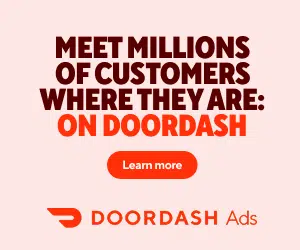 DoorDash Ads banner on a light pink background reading 'MEET MILLIONS OF CUSTOMERS WHERE THEY ARE: ON DOORDASH' in bold dark red text, with a red 'Learn more' button and the DoorDash Ads logo beneath