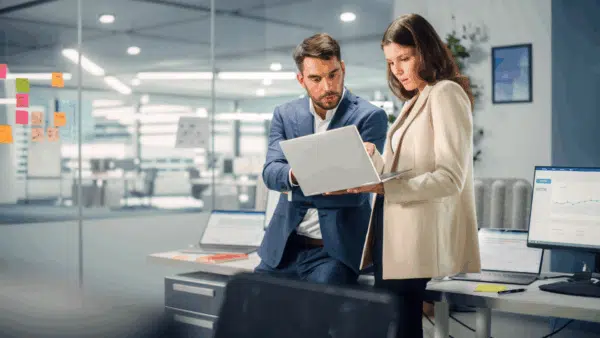 Young-Manager-Talking-with-Experienced-Colleague