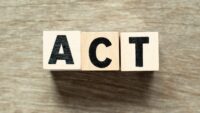 ACT-letter-blocks-on-wooden-background