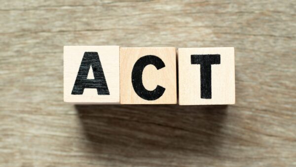 ACT-letter-blocks-on-wooden-background