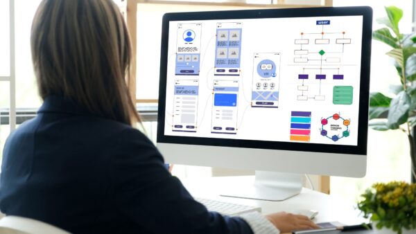 Website-designer-working-on-mobile-site-UI